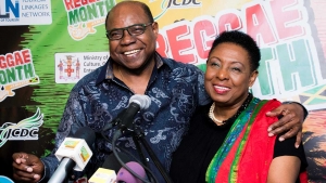 The Minister of Culture, Gender, Entertainment and Sport, the Honourable Olivia Grange (right) shares a light moment with the Minister of Tourism, the Honourable Edmund Bartlett at the launch of Reggae Month 2019, being organised by both ministries.  February is Reggae Month.