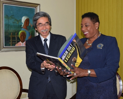 As the Ambassador of Japan to Jamaica, His Excellency Masanori Nakano, paid his final Courtesy Call on the Honourable Olivia Grange, Minister of Culture, Gender, Entertainment and Sport, he expressed his pleasure at receiving a signed copy of the book, ‘Usain Bolt: Legend’ from the Minister. During the farewell Courtesy Call today (Tuesday) at the Ministry, Minister Grange thanked the Ambassador for all the support that his Government and the people of Japan have given to Jamaica. Ambassador Nakano will complete his tour of duty on October 10, 2017.