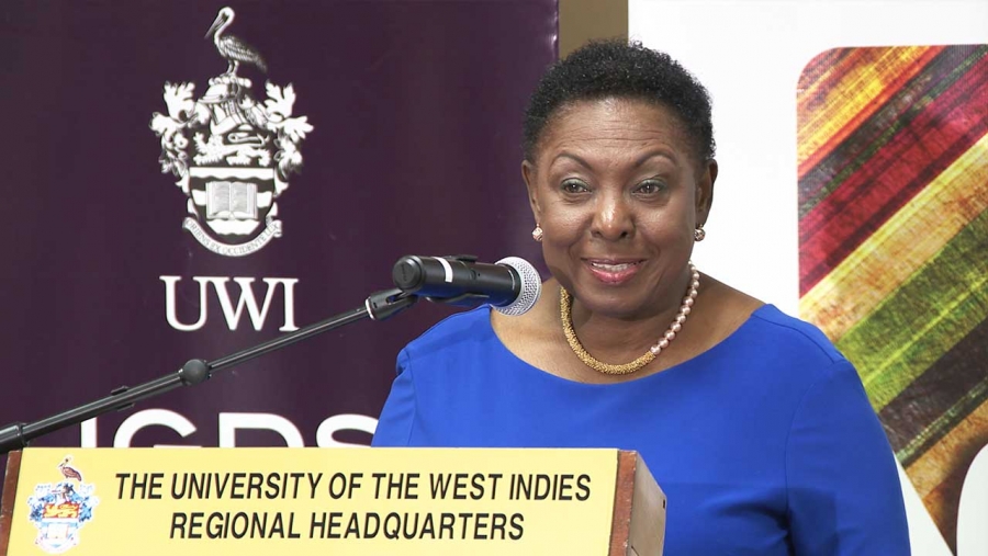 Minister of Culture, Gender, Entertainment and Sport, the Honourable Olivia Grange, addresses the Policy Meeting on Masculinity in the Caribbean at the University of the West Indies Regional Headquarters at Mona.