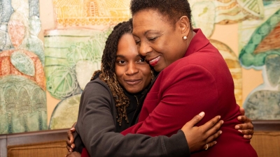 The Minister of Culture, Gender, Entertainment and Sport, the Honourable Olivia Grange (right), embraces Grammy-winning Reggae artiste, Koffee, at Norman Manley International Airport on Monday. The Minister went to welcome home the singer who won the Grammy Award for Best Reggae Album in January 2020.