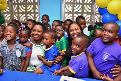 The Honourable Olivia Grange, Minister of Culture, Gender, Entertainment and Sport and Tanisha Miller, Community Relations Manager, Early Childhood Commission shared a light moment with some of the entrants in this year’s INSPORTS Basic School Athletics Championships at the launch. The Championship will be held at the National Stadium from June 13-15.