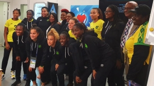 Minister of Culture, Gender, Entertainment and Sport, the Honourable Olivia Grange with JFF President, Michael Ricketts; women's football campaigner, Elaine Walker Brown and members of the Reggae Girlz in Paris, France