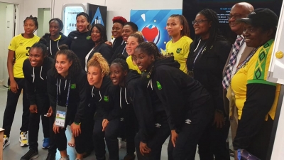 Minister of Culture, Gender, Entertainment and Sport, the Honourable Olivia Grange with JFF President, Michael Ricketts; women&#039;s football campaigner, Elaine Walker Brown and members of the Reggae Girlz in Paris, France
