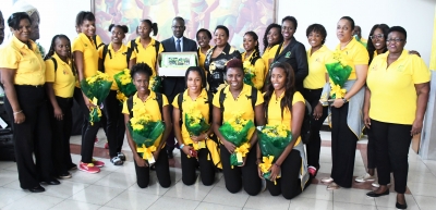 The Honourable Olivia Grange, Minister of Culture, Gender, Entertainment and Sport; Permanent Secretary, Denzil Thorpe, President Dr Paula Daley-Morris and Officials of Netball Jamaica; Sponsor Representative, Coaches Sasher-Gaye Henry and Marvette Anderson with members the Sunshine Girls team who won a bronze medal at the just concluded Commonwealth Games in Australia. The team was met by the Minister at the Norman Manley International Airport upon their arrival today (April 17).