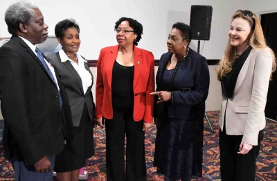 The Honourable Olivia Grange, Minister of Culture, Gender, Entertainment and Sport makes a point to Everton Hannam, Secretary General, Jamaica National Commission for UNESCO (left). Also a part of the conversation were: Ambassador Marcia Gilbert-Roberts, Permanent Secretary, Ministry of Foreign Affairs and Foreign Trade; Joy Douglas, Chairman, Man and the Biosphere National Committee and Katherine Grigsby, Director, UNESCO Office for the Caribbean (left to right).