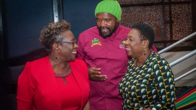 The Minister of Culture, Gender, Entertainment and Sport, the Honourable Olivia Grange (right) shares a light moment with Entertainer, Tony Rebel (centre) and the Director of Public Prosecutions, Paula Llewellyn at the launch of Rebel Salute 2019 on Thursday, 28 December 2018.