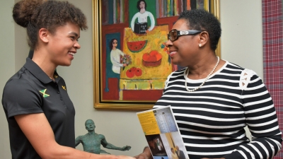 The Honourable Olivia Grange, Minister of Culture, Gender Entertainment and Sport (right) greets Lydia Heywood, the English-born Eventing rider who plans to represent Jamaica at the next Olympics