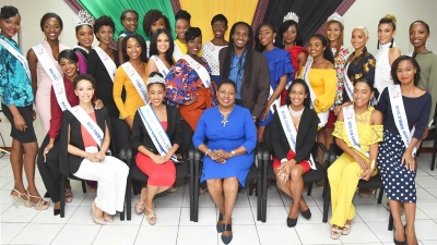 The Honourable Olivia Grange, Minister of Culture, Gender, Entertainment and Sport (seated third left) has told finallists in the Miss Universe Jamaica 2018 Pageant that the Ministry is willing to work with them especially since they all have interests and skills related to her portfolio. Miss Grange received the contestants when they paid a Courtesy Call on her at the Ministry on Wednesday during which they were also introduced to the Honourable Alando Terrelonge, Minister of State in the Ministry.