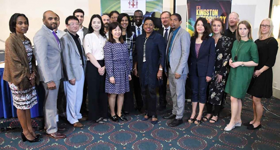 The Honourable Olivia Grange, Minister of Culture, Gender, Entertainment and Sport and Senator Councillor Delroy Williams, Mayor of Kingston (centre) are joined by delegates attending the four-day meeting of the UNESCO Creative Cities of Music Subnetwork taking place at the Jamaica Pegasus.