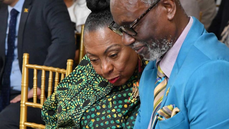 The Minister of Culture, Gender, Entertainment and Sport, the Honourable Olivia Grange and the Minister of Local Government and Rural Development, the Honourable Desmond McKenzie confer at the Media Launch of Labour Day 2023