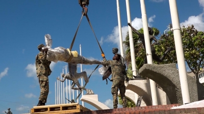 Soldiers from the Jamaica Defence Force mounting the statue of Asafa Powell at Statue Park, National Stadium.  Prime Minister, the Most Honourable Andrew Holness, will unveil the statue in special ceremony on Sunday, 9 February 2020.