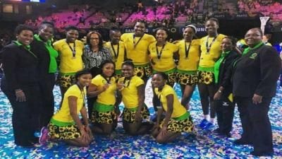 Members of Jamaica&#039;s senior netball team pose with their silver medal at the Fast5 Netball tournament in Australia.