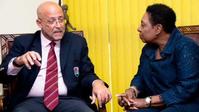 Minister of Culture, Gender, Entertainment and Sport, the Honourable Olivia Grange (right) meets with Cricket West Indies President, Ricky Skerritt in 2019