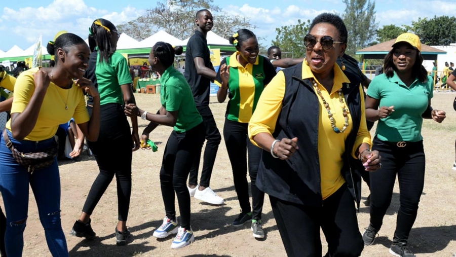 The Minister of Culture, Gender, Entertainment and Sport, the Honourable Olivia Grange participating in Jamaica Day activities at the Denbigh High School in Clarendon,