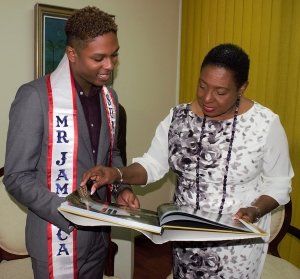 Franz Christie, Jamaica’s representative in the Mister Supranational Competition was pleased to receive a copy of the book, ‘Jamaica: Heritage in Pictures’ from the Honourable Olivia Grange, Minister of Culture, Gender, Entertainment and Sport yesterday (Monday) when he paid a Courtesy Call on the Minister at her offices in Kingston. The Mister Supranational competition focuses on the best male attributes including attractiveness, great personality, ingenuity, competitiveness, care of and respect for women. The finals will take place in Poland on December 2.