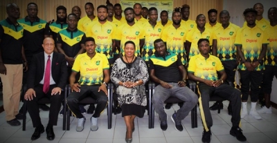 Reggae Boyz visit Minister Grange on eve of departure for Gold Cup