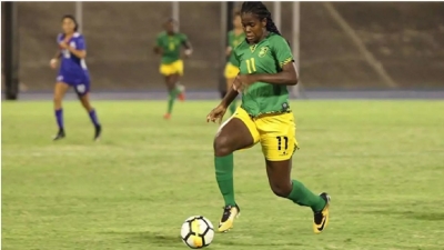 Khadija Shaw of the Reggae Girls carrying it home for the fans